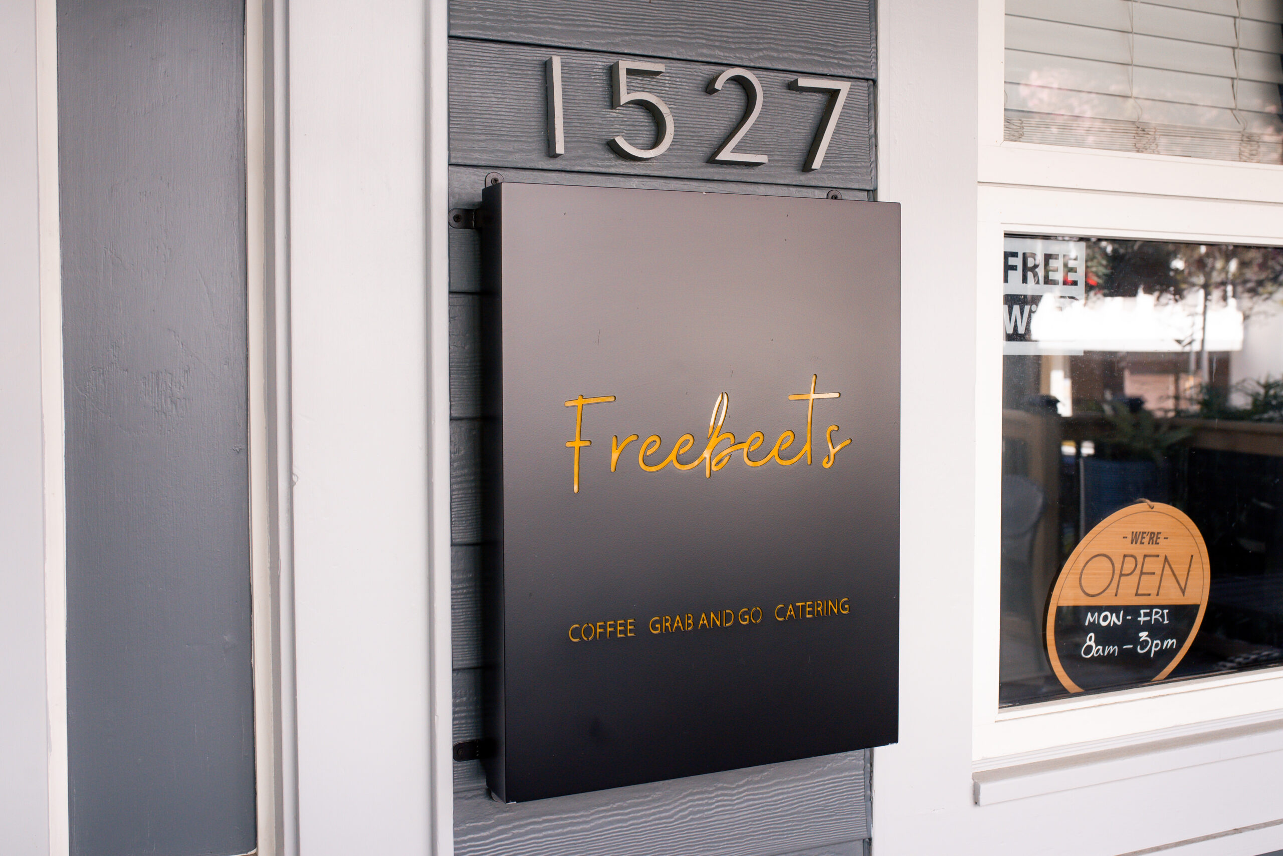 Happy customers enjoying food and coffee at FreeBeets Café