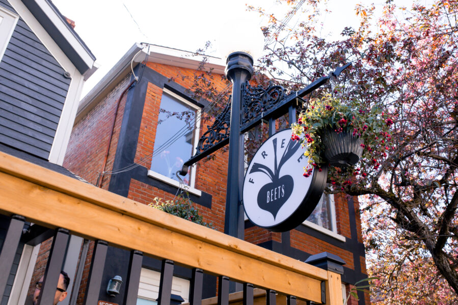 Friendly staff serving food and drinks at FreeBeets Café